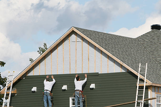 Professional Siding technician working in Oilville, VA